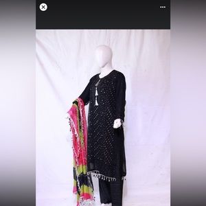 Shiffon selwar suit with Ty dy dupatta. And all over silver mukesh work.